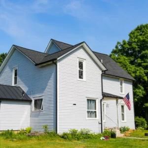 Grey home with new roof