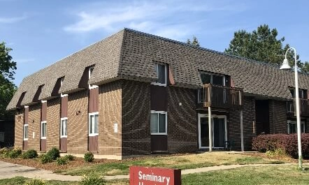 Apartment building with Shingle Mansard Roof